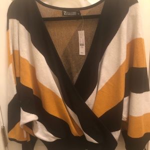 Gold, black and white sweater